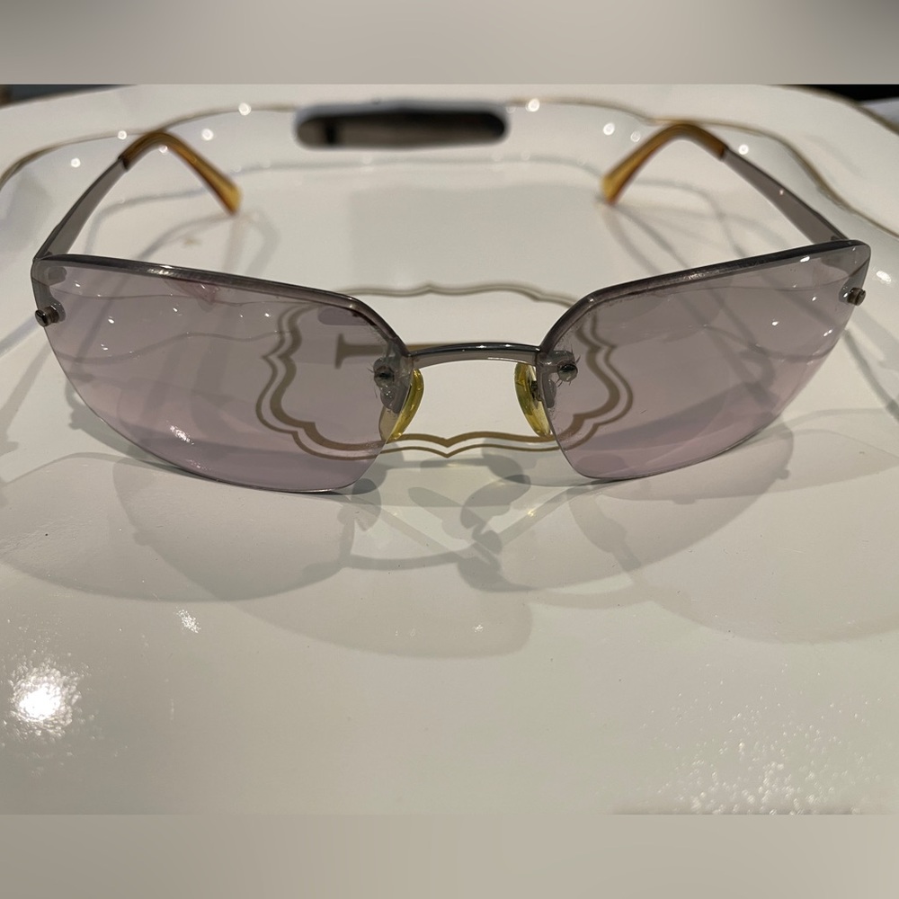 Coach Gold and Gray Sunglasses Rimless Design